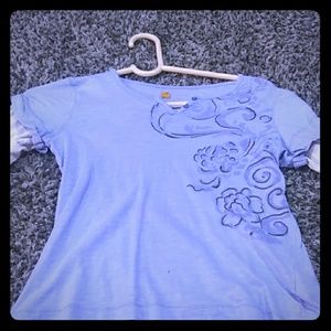 Long sleeve shirt with cute blue flowers on them.